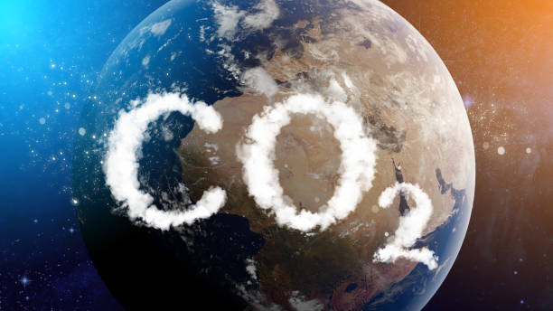 World with co2 pollution shaped clouds concept. stock photo