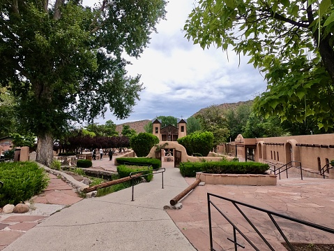 Aug/01/2021 Chimayo,NM,USA.\nA church famous for its miraculous sand, which is said to cure injuries and illnesses.\nThe square and the front entrance of the building.No People.