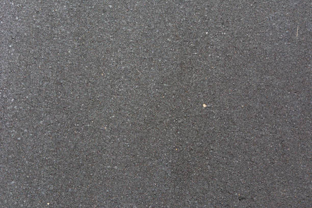 istock grey asphalt. background for design and decoration. 1346032280