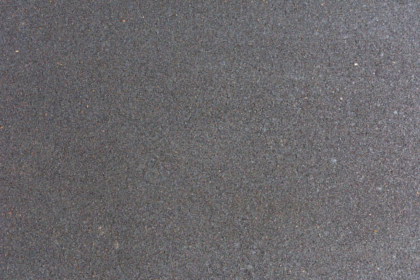istock grey asphalt. background for design and decoration. 1346032282