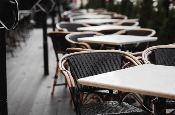 istock autumn cityscape of an open cafe 1346032376
