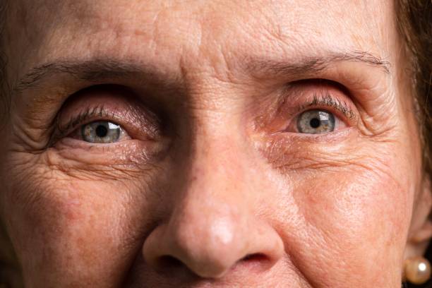 istock Pensive Senior woman looking at the camera 1346033837