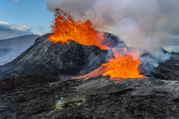 istock Volcanic eruption with lava in Iceland 1346035397