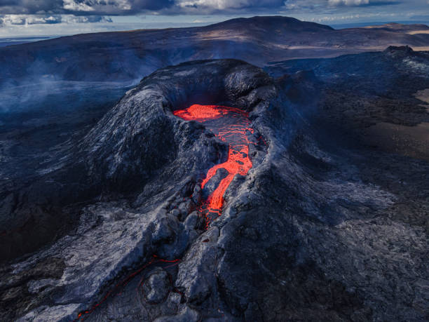 istock View into the volcanic crater with lava 1346036128