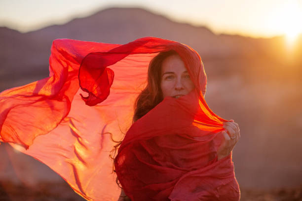 istock Beautiful woman resting in the desert 1346038882