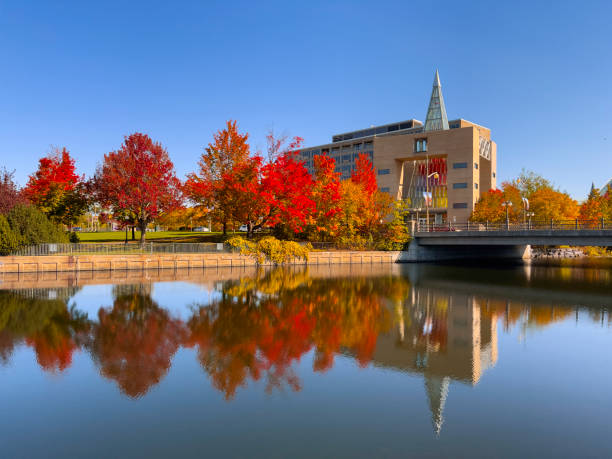 istock Rideau Rover and Global Affairs building in fall colours 1346040935