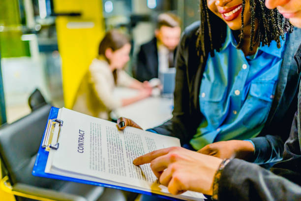 istock Young business people are discussing contract 1346041606