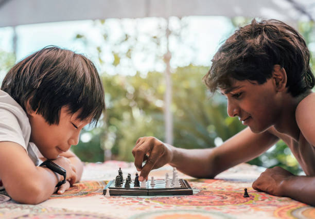 10,400+ Kids Playing Chess Stock Photos, Pictures & Royalty-Free Images -  iStock