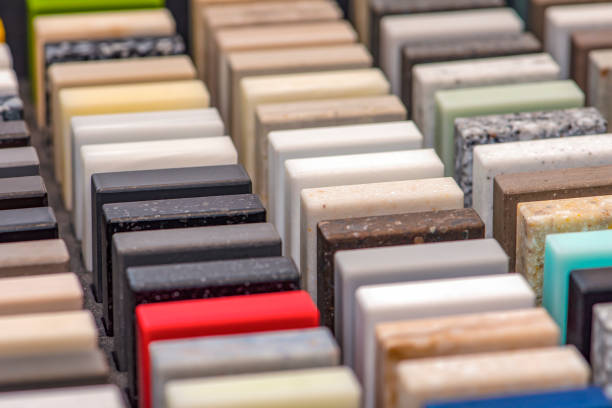 istock Samples of decorative artificial stone, close-up. Stone samples for kitchen countertops or bathroom, modern interior design 1346046546