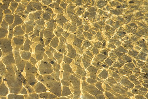 istock Water in a fountain on a sunny day 1346053617