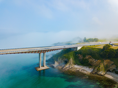 Aerial view on dos Santos bridge during fog and bay. Near Ribadeo in Northern Spain.