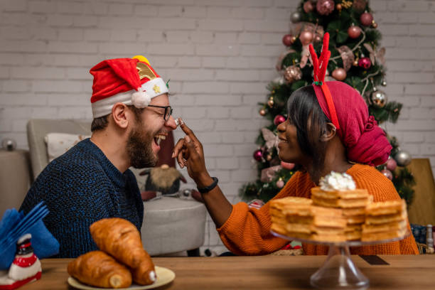 istock Couple celebrating christmas 1346054499