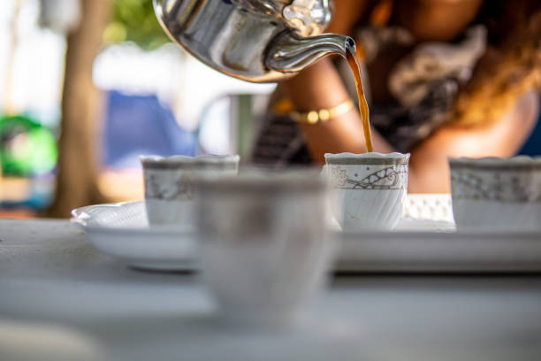 istock pouring coffee to glass 1346057701
