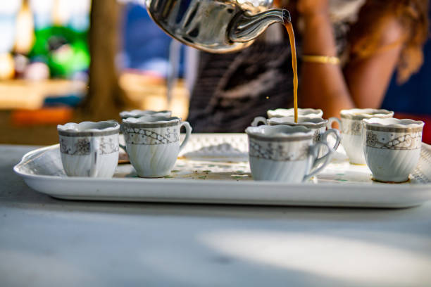 istock pouring coffee to glass 1346057709