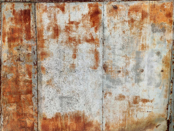 istock Corroded metal background. Rusty metal background with streaks of rust. Rust stains. Rystycorrosion. 1346060587