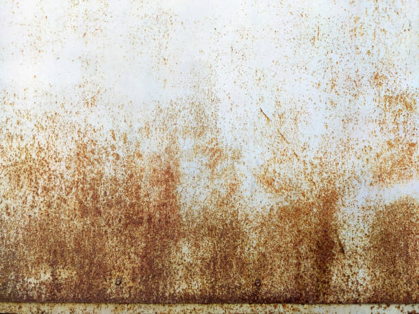 istock Corroded metal background. Rusty metal background with streaks of rust. Rust stains. Rystycorrosion. 1346060590