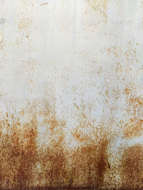 istock Corroded metal background. Rusty metal background with streaks of rust. Rust stains. Rystycorrosion. 1346060594