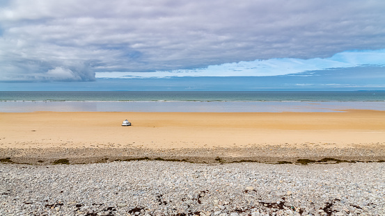 Beautiful beach at Vauville in Normandy, with pebbles