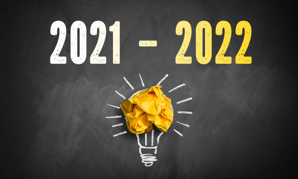 istock chalkboard with message 2021 - 2022 and a lightbulb using crumpled paper 1346063640