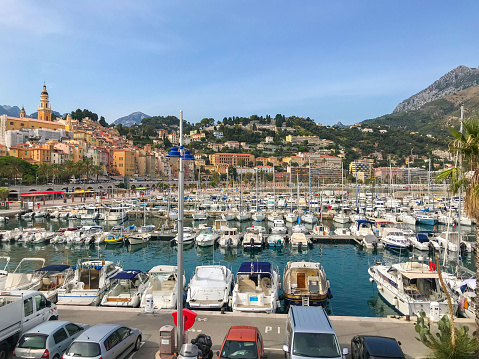 Menton, France - September 15 2019: Garavan port and Old Town, daytime view