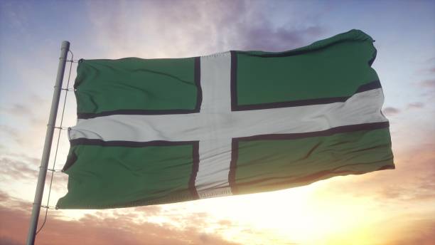 Devon flag, England, waving in the wind, sky and sun background. 3d rendering Devon flag, England, waving in the wind, sky and sun background. 3d rendering. plymouth michigan stock pictures, royalty-free photos & images
