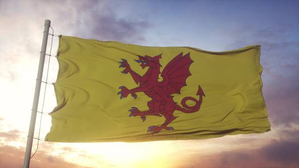 istock Somerset flag, England, waving in the wind, sky and sun background. 3d rendering 1346066602