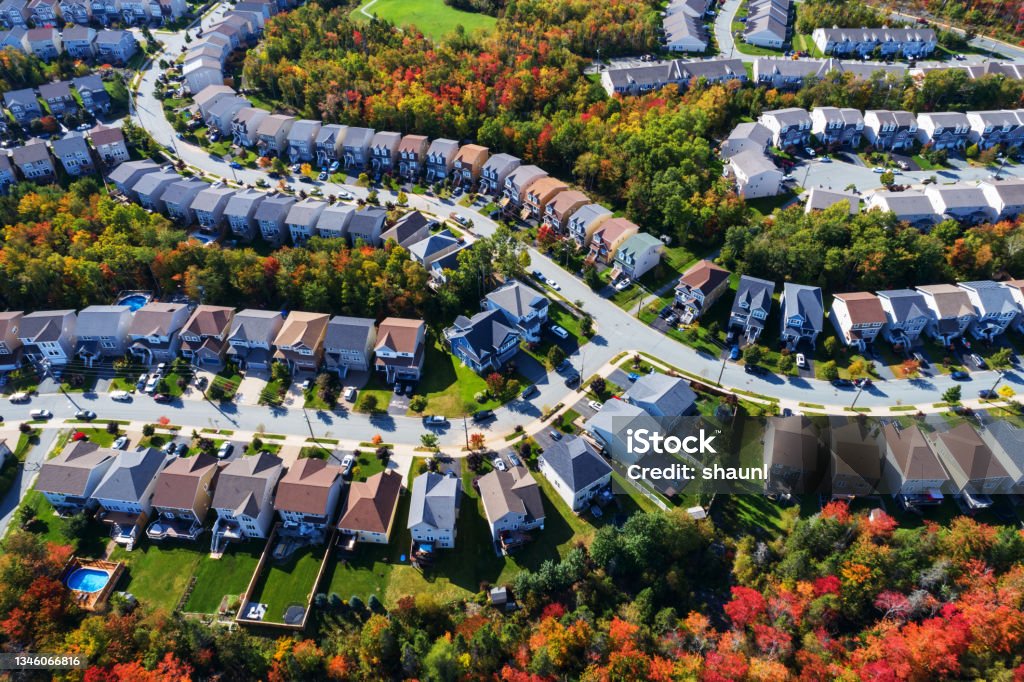 Aerial View of Suburban Landscape An aerial drone view of a suburban landscape in Autumn. Residential District Stock Photo