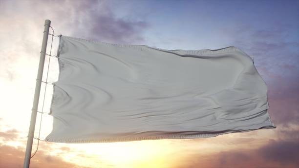 istock White Flag waving in the wind, sky and sun background. 3d rendering 1346067048
