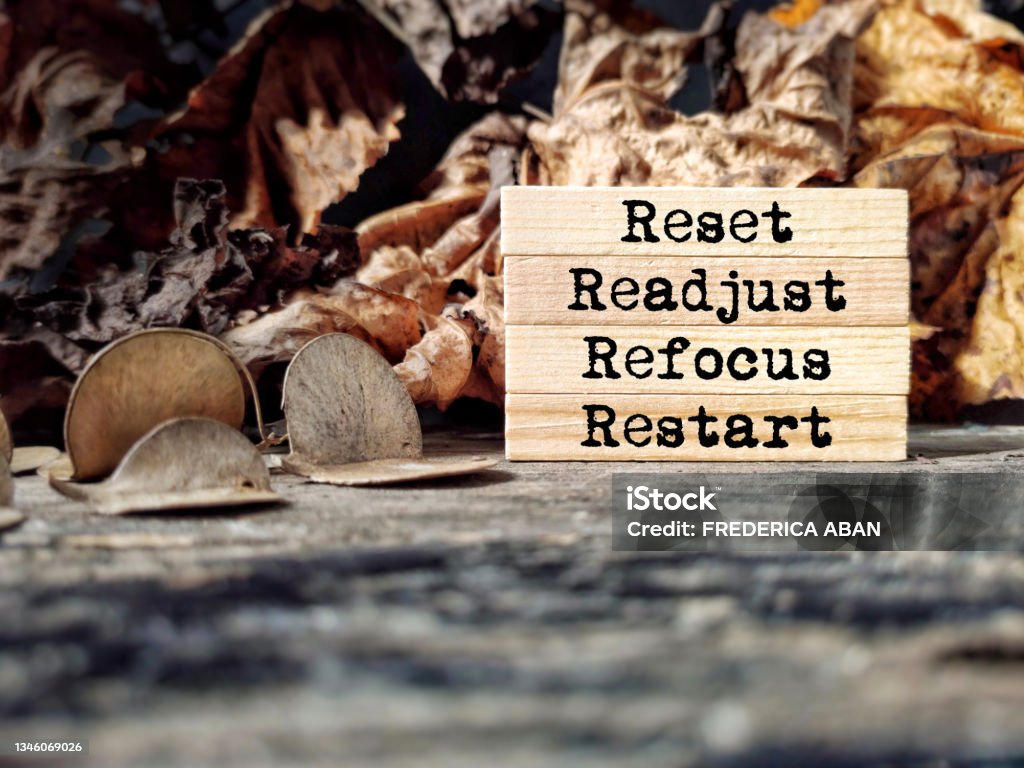 Inspirational and Motivational Concept Reset readjust refocus restart text background. Stock photo. Beginnings Stock Photo