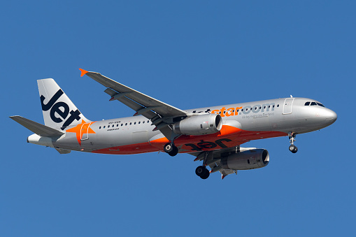 Melbourne, Australia - September 23, 2013: Airbus A320-232 airliner operated by Australian low cost airline Jetstar airways on approach to land at Melbourne Airport.