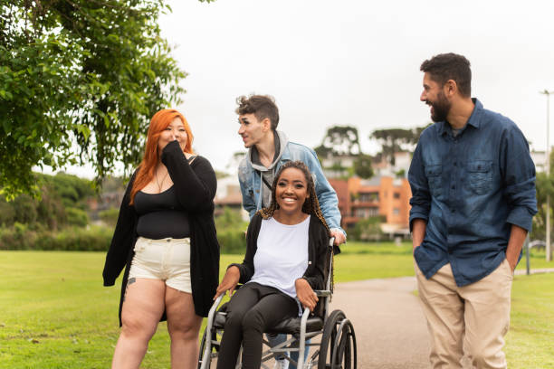 istock Group of friends having fun in the park. 1346070049