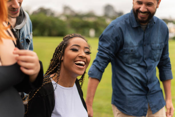 istock Group of friends having fun in the park. 1346070079