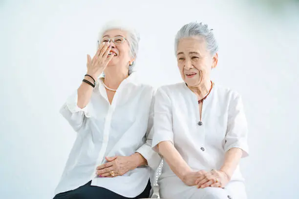 Photo of Senior women talking with a smile