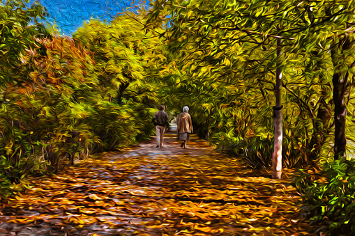 Autumn landscape with people walking in pathway covered by fallen leaves, in Budapest. The vibrant and historic capital of Hungary. Oil paint filter.