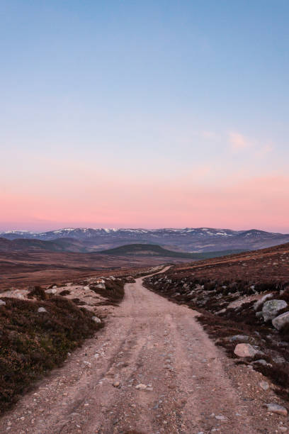 Hiking Trail through Cairngorms in Scotland during sunrise stock photo
