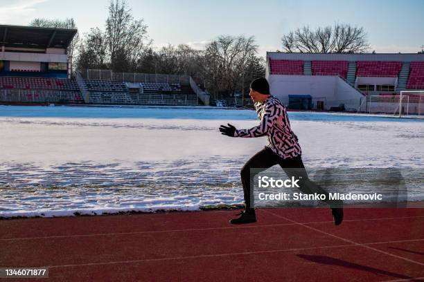 Athlete Running Sprinting Stock Photo - Download Image Now - 25-29 Years, Active Lifestyle, Adult