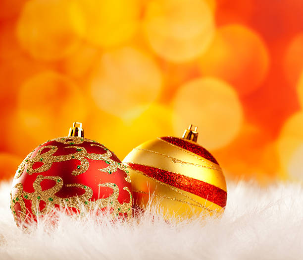 istock christmas baubles on white fur and lights 134607321