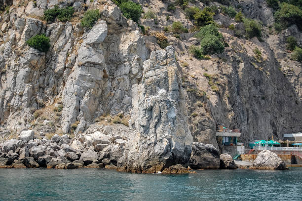 istock rocks over the seaside landscape 1346073604