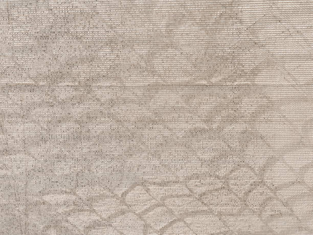 istock Chain-link Shadows on Woven Privacy Screen - Angle 1346075354