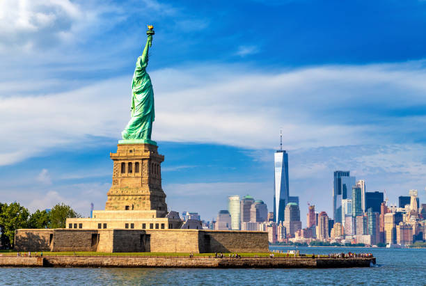 istock Statue of Liberty against Manhattan 1346077300