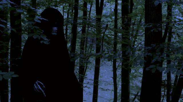 Grim Reaper skull walking with a lantern in the woods.