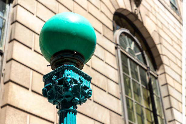 Black metal street lamp isolated on a white background. Background with copy space.