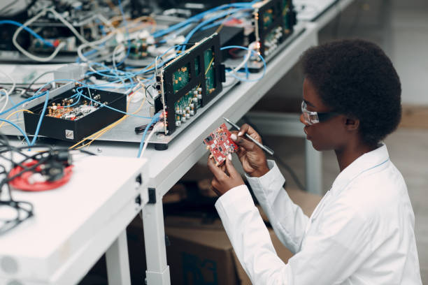 istock Scientist african american woman working in laboratory with electronic instruments 1346080597
