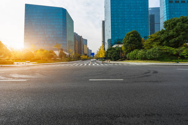 istock Empty asphalt road through modern city in Shanghai, China 1346085539