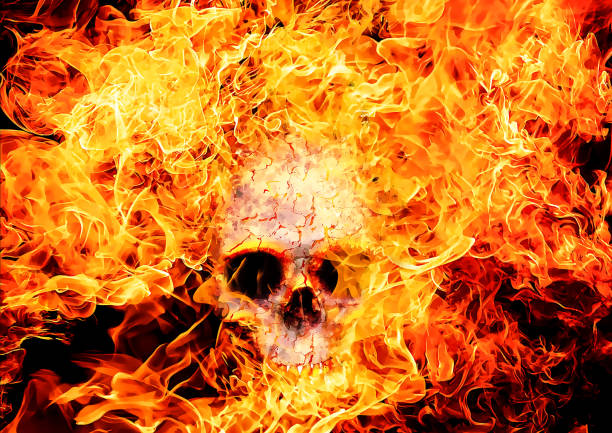 istock Illustration of a skull wrapped in burning flames 1346091662