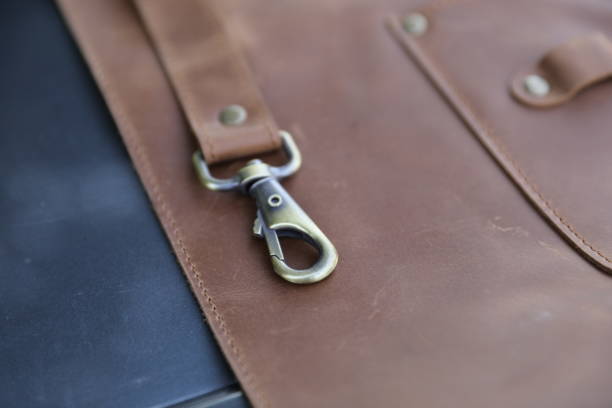 istock Brown Leather Aprons.  Hook Leather Working Apron. Welding Leather Apron.Leather Apron with Hook. Close-up of Brown  Leather Apron. 1346100184