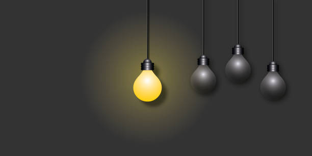 istock Yellow light bulbs on dark background, Ideas inspiration concepts of business. 1346101743