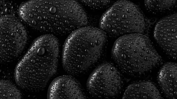 Black Stones.rock background and water drop