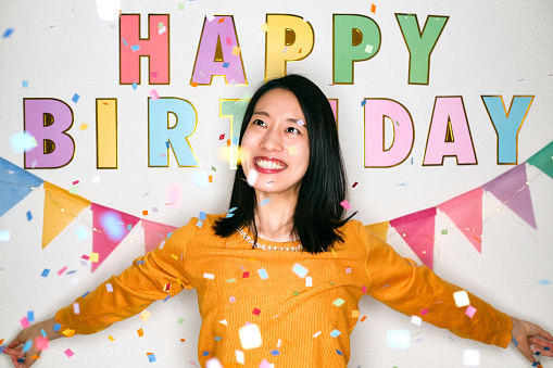Portrait of woman at birthday party