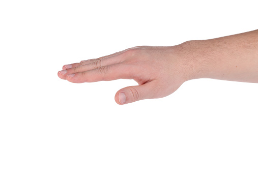 The person's hand is turned palm down. Isolated over white background. Close-up.
